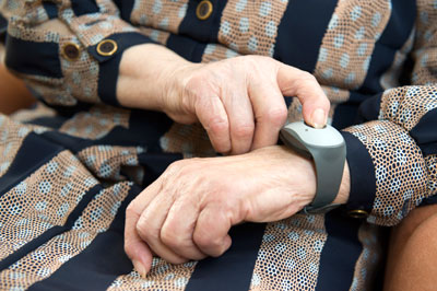 Elderly woman with emergency call system