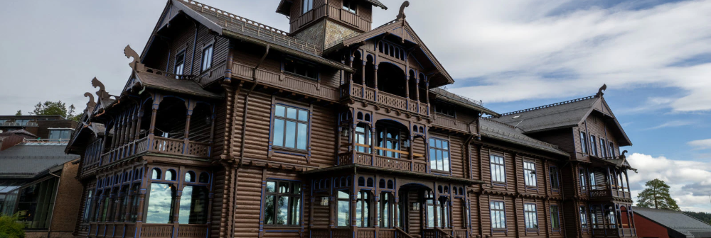 Facade of hotel - wooden building in Norwegian dragon-style