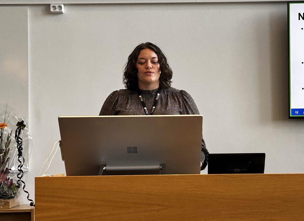 Kamilla Arnesen giving talk at PhD defence. Photo
