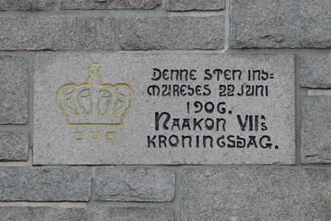 Memorial stone mortared into the Main Administration building's facade