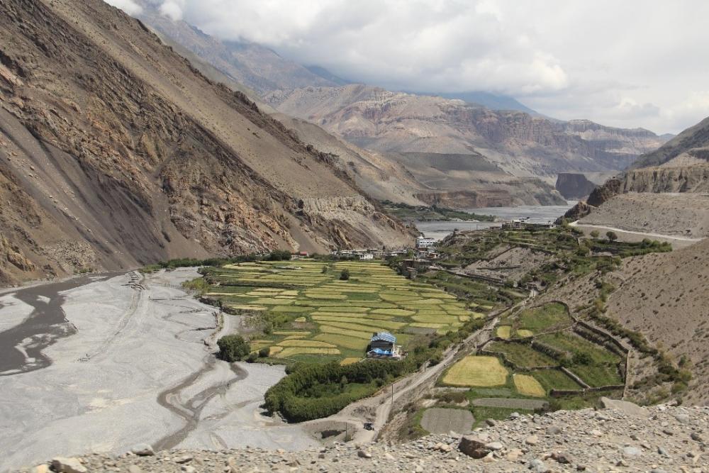 Fields, rocky mountains and hills. Photo.