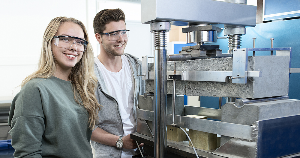 Smiling students at lab