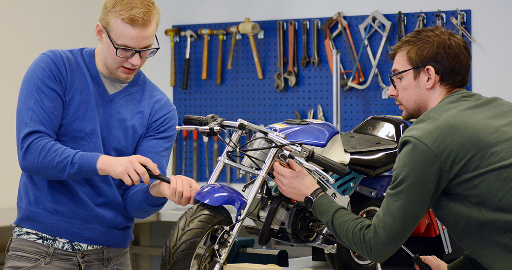 Students working on prototype motorcycle