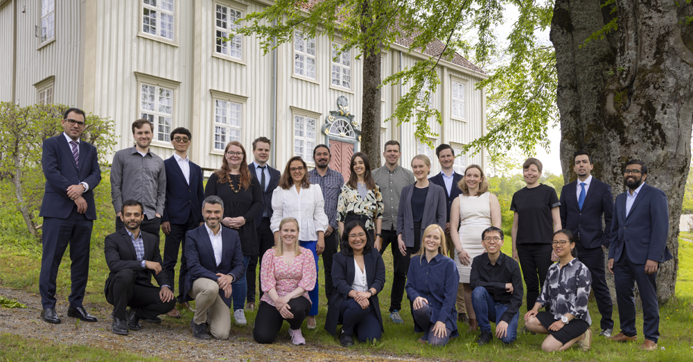 Outstanding Academic Fellows 2019-2023 together with former Pro-Rector for Research Bjarne Foss