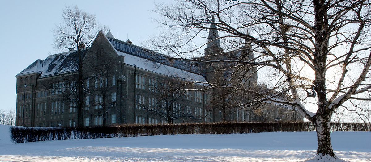 University stone building on a snowy winter's day