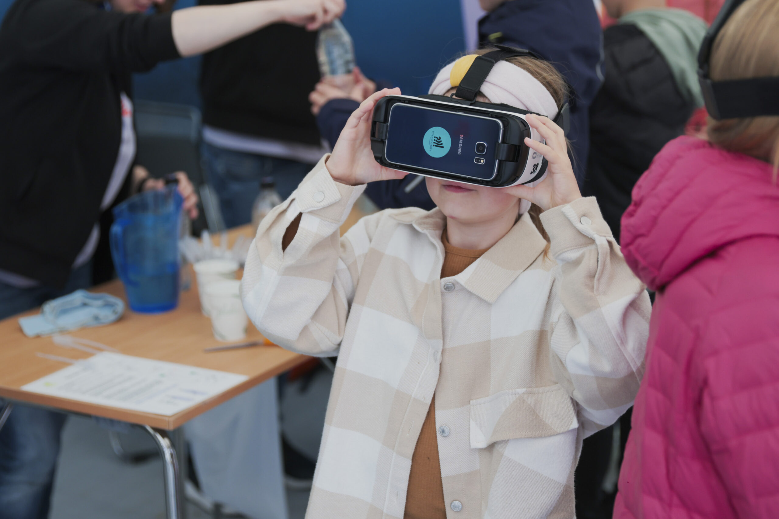 A child with a VR mask