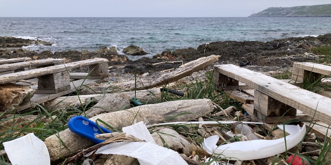 Piles of plastic garbage on a beach