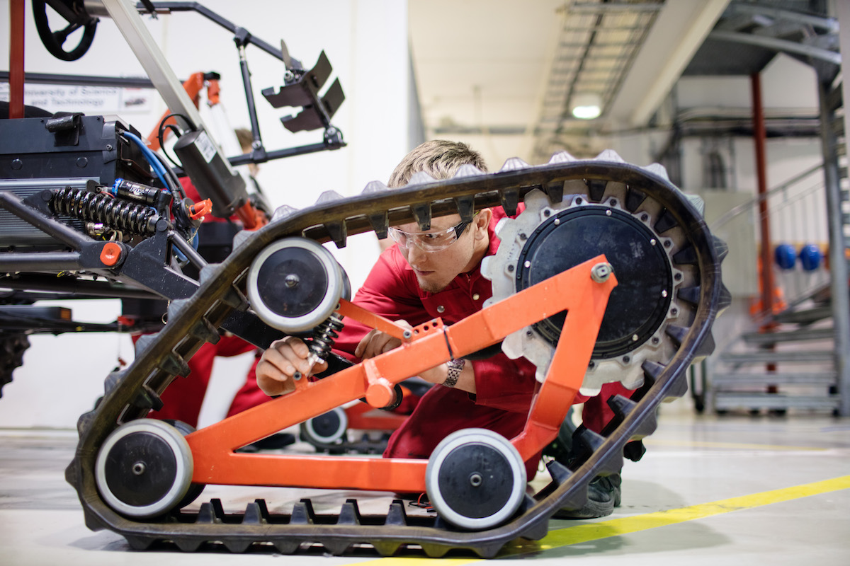 Student working on a robot