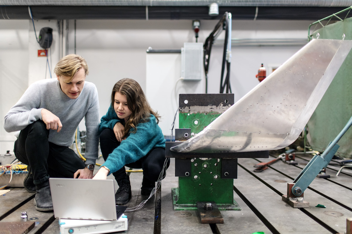 students working on a laptop