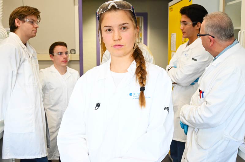 Student in front of students