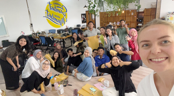 Ulva in a picture with students in Indonesia