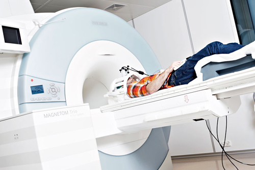 MR machine with patient entering the machine