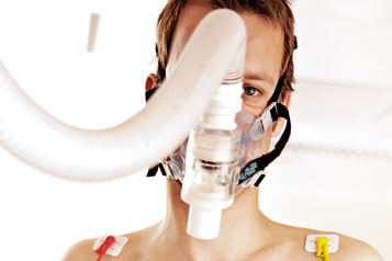Close up of a test person with oxygen mask