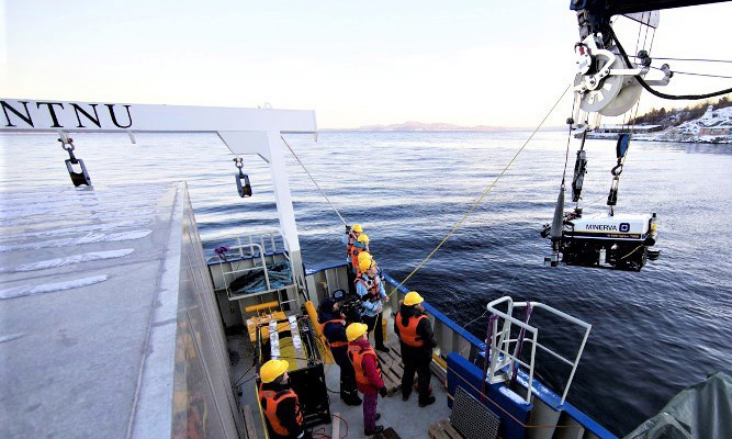 ROV is hoisted onboard the research vessel