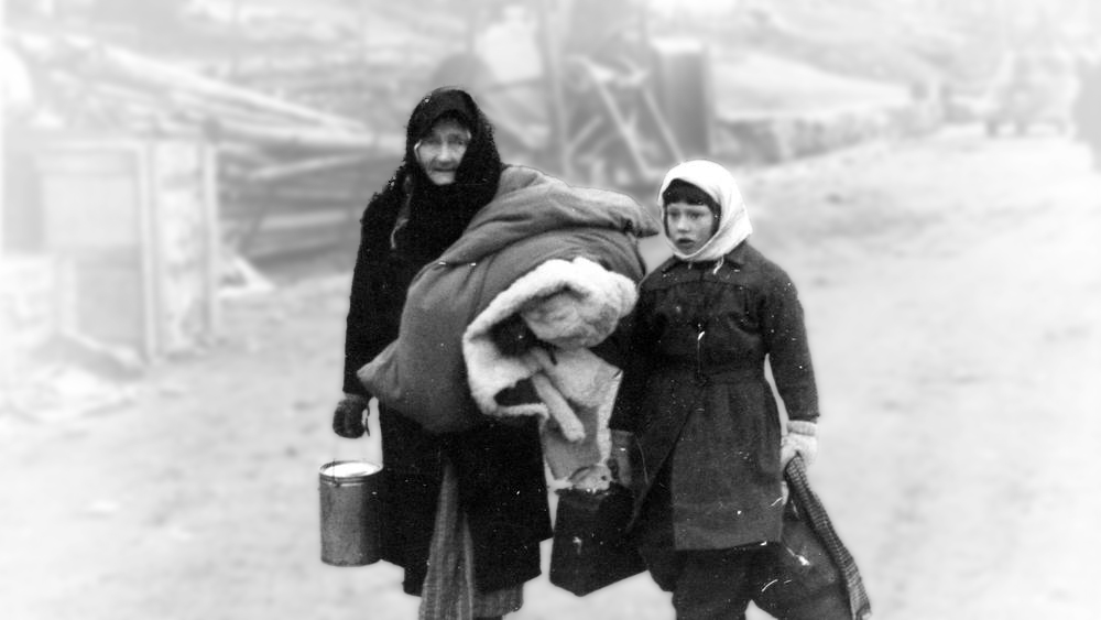 Forced evacuation from Finnmark 1944. An elderly woman and her granddaughter are forced away from their home.