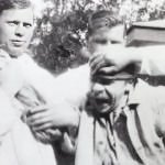 A patient being admitted to a mental asylum in 1923. Health workers are physically restraining him.