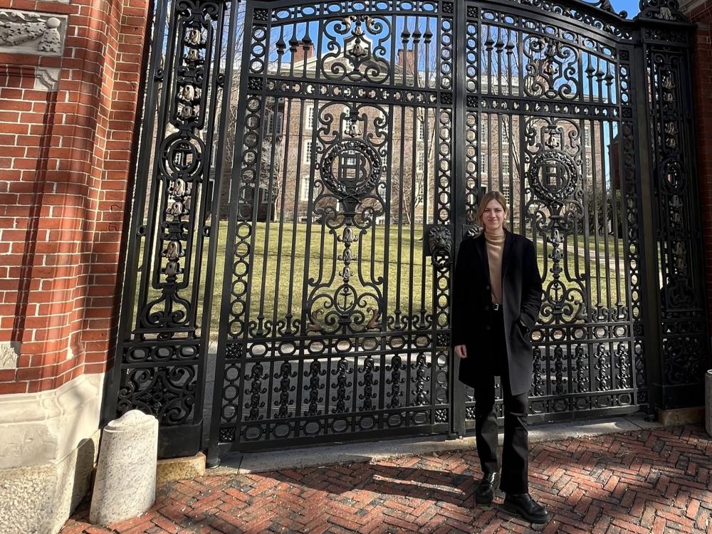Katarzyna in front of gates at Brown University