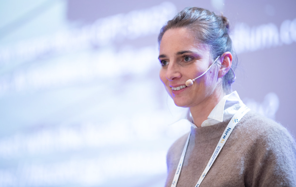 Woman talking on stage