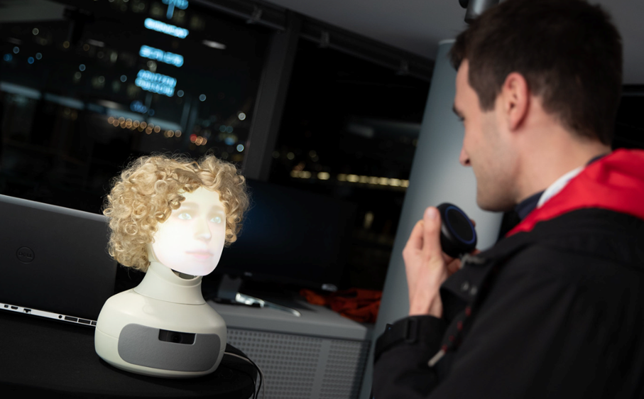 Man speaking with a robot