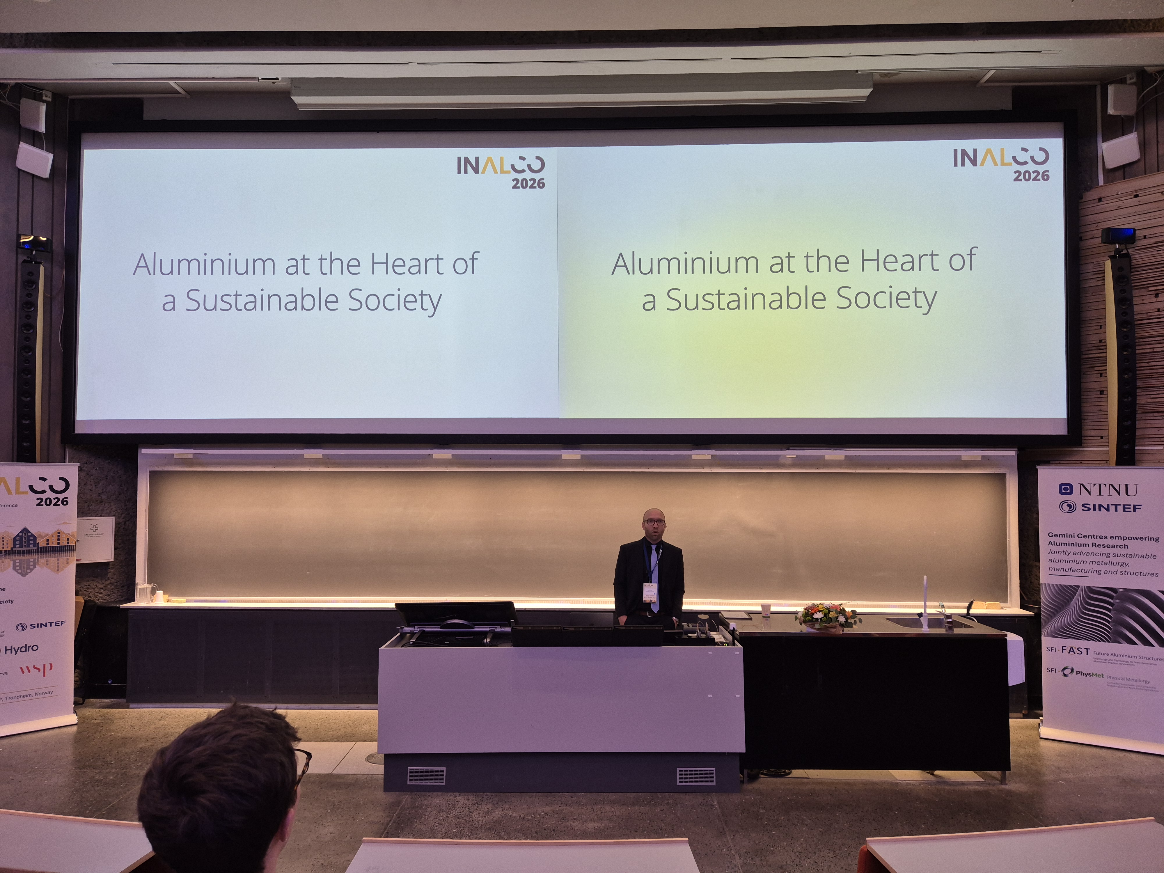 Man speaking at a cinference.