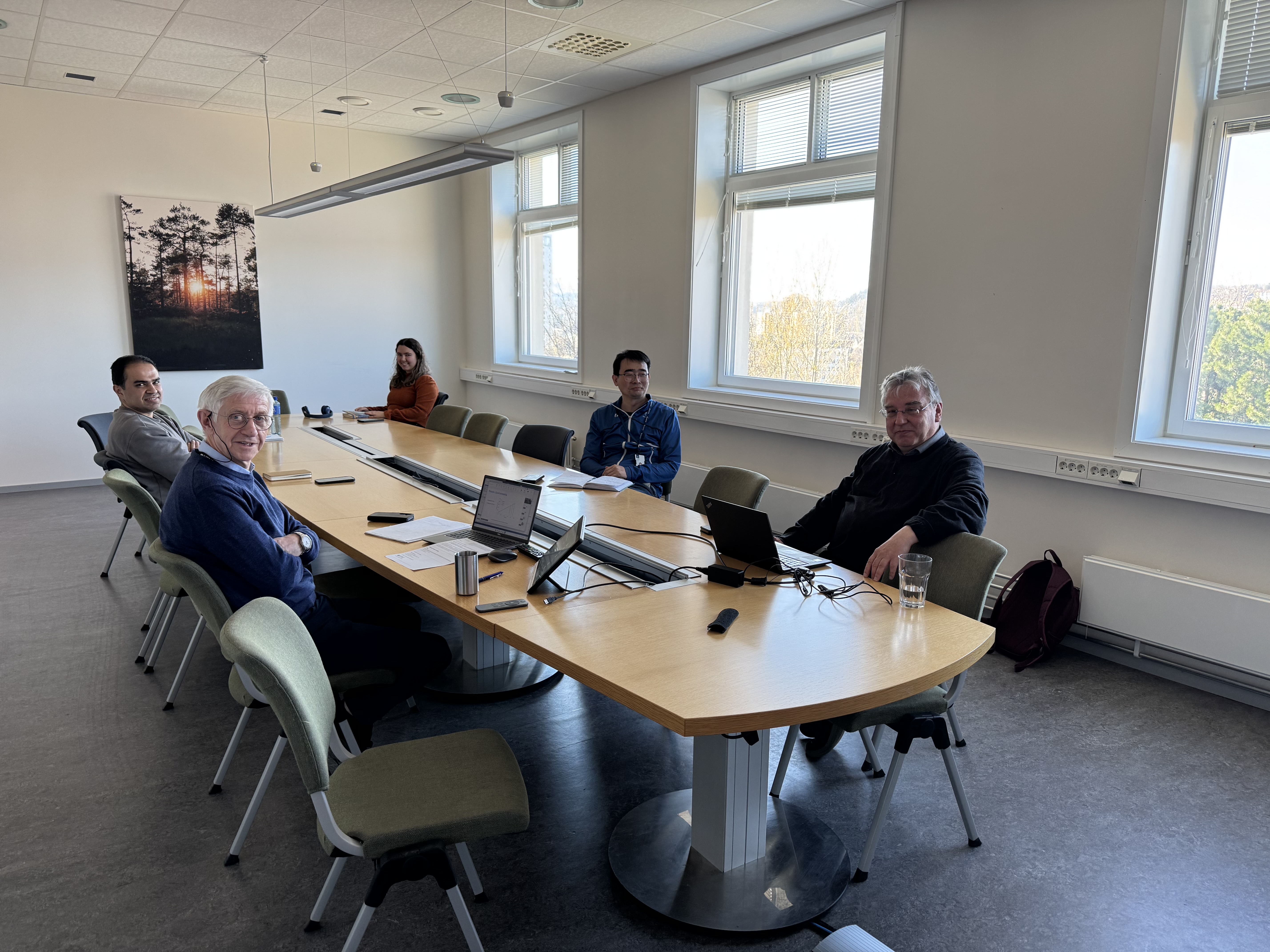 Group of people at a table.