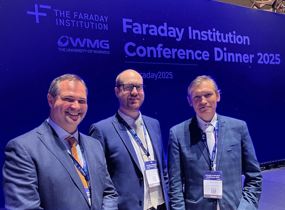 three men in suits. photo