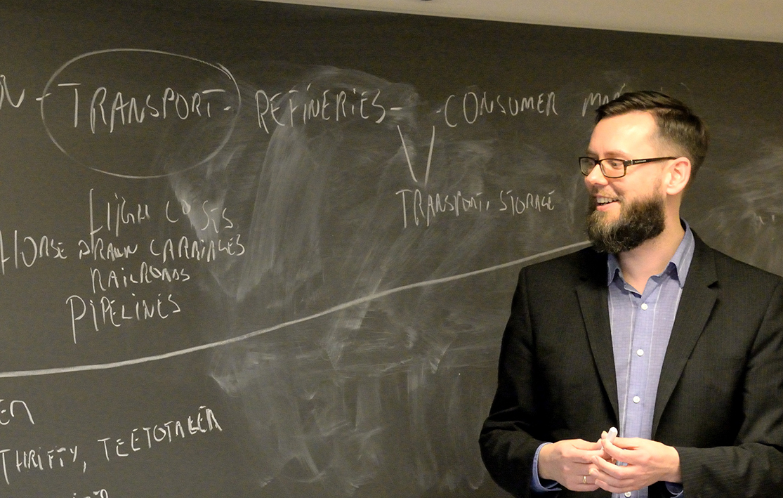 Professor Espen Storli in front of a teaching board