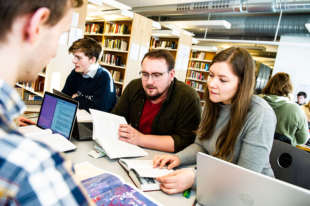 Four students talking