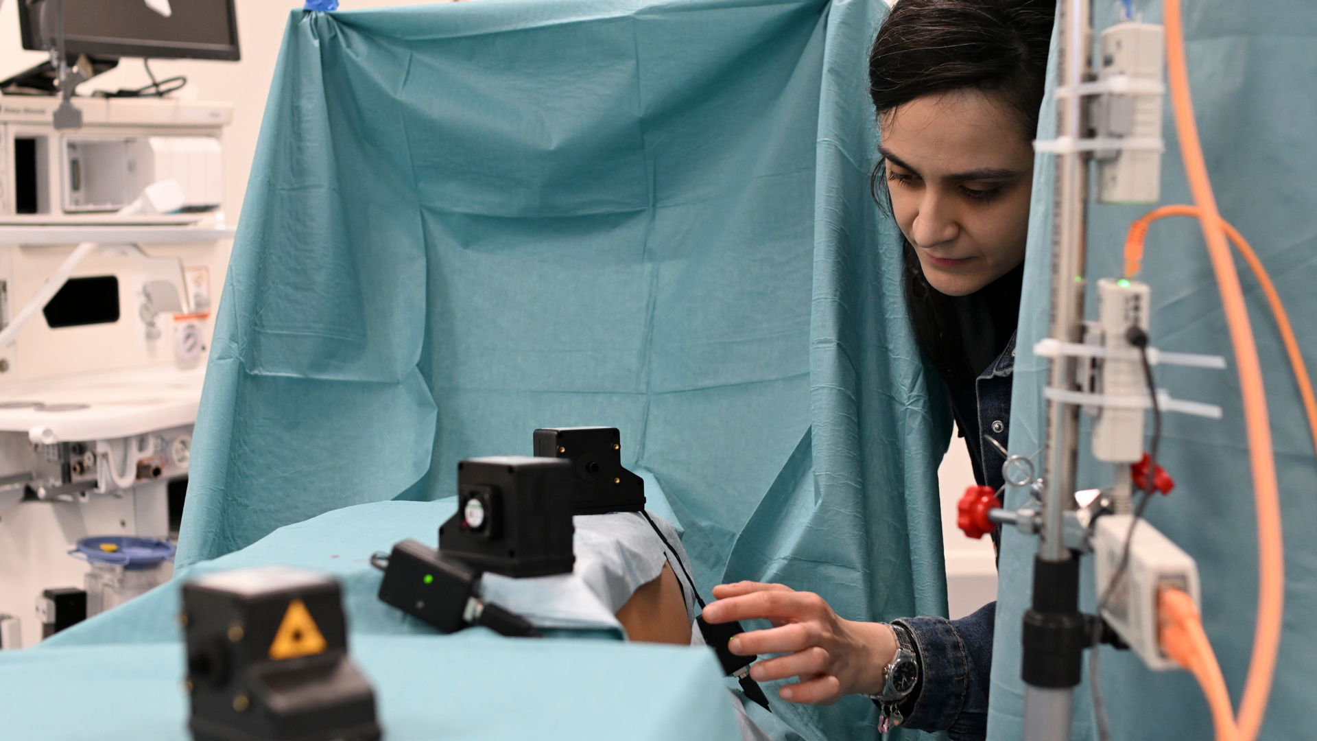 person in lab with equipment. photo
