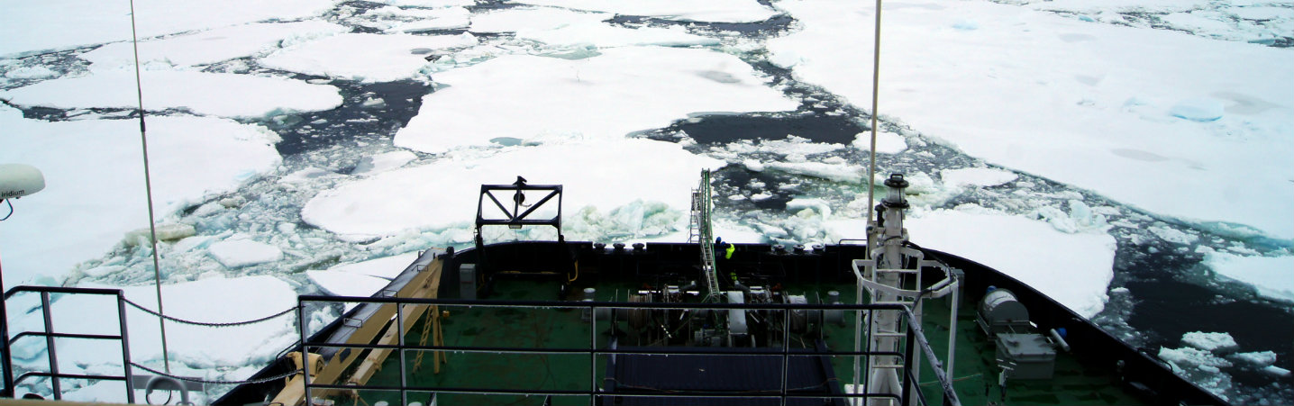 Boat front in sea ice. Photo.