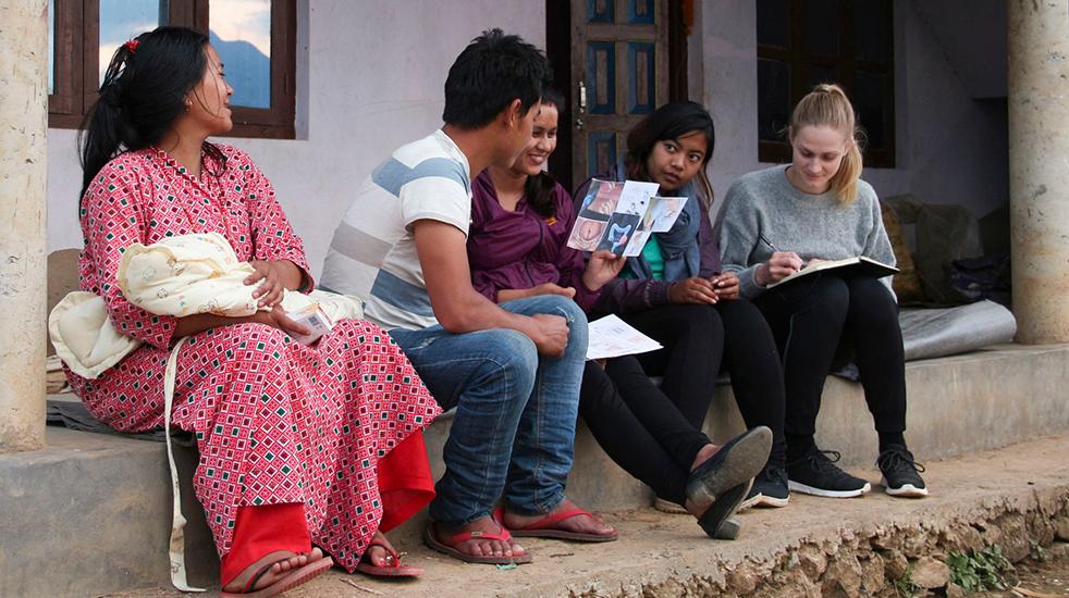 Photo of new parents in a village during a usertest