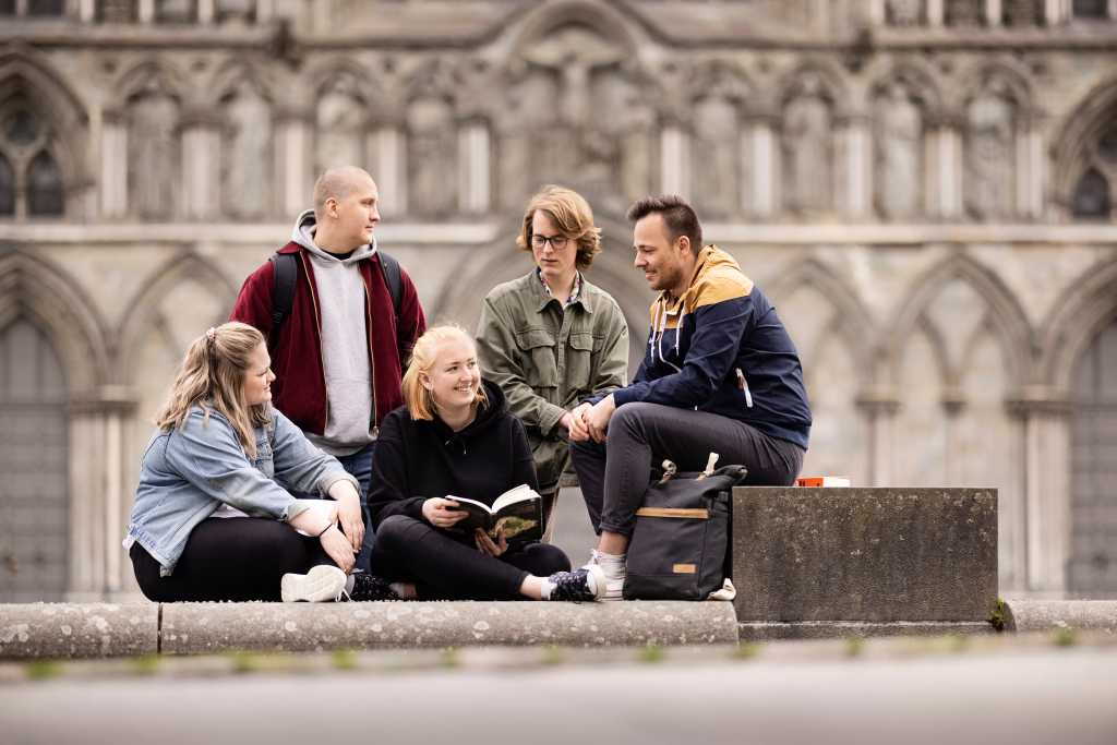 Five students outside Nidarosdomen cathedral