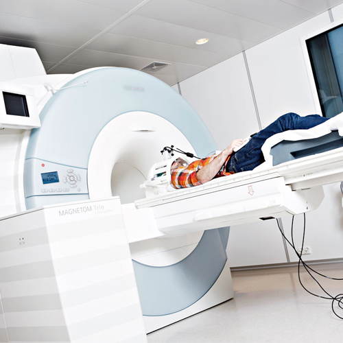 MR machine with patient entering the machine