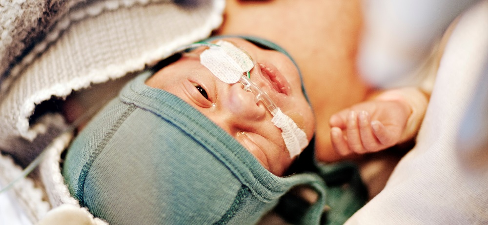 Baby with oxygen probe