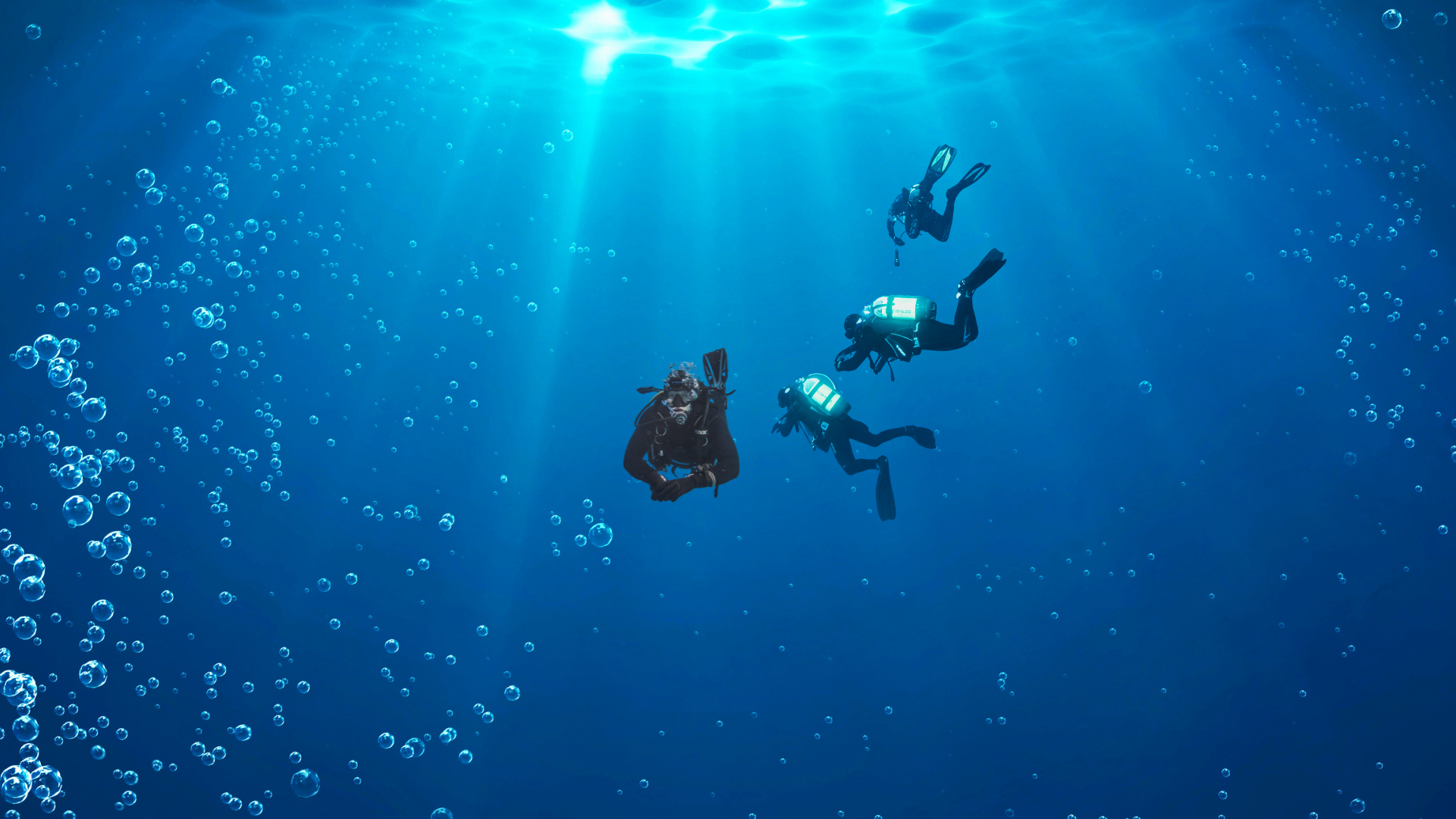 Illustration of divers under water and bubbles