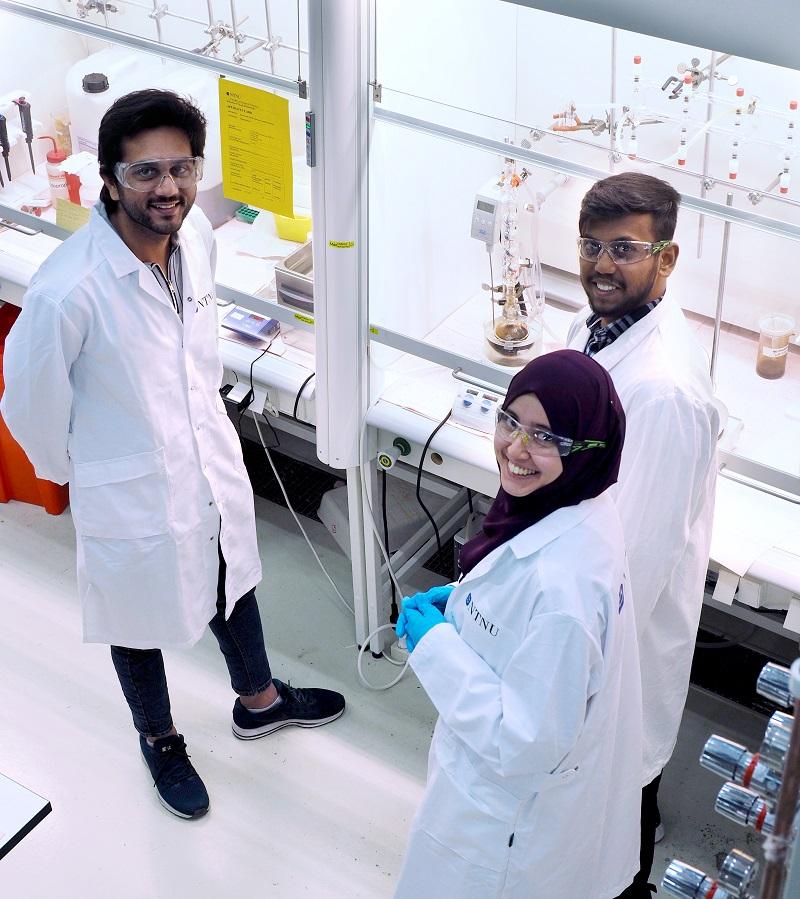 PhD students at lab