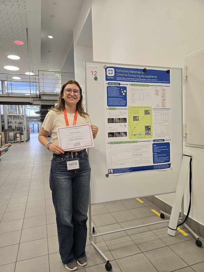 woman with diploma and poster