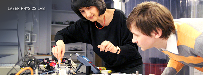 Professor Irina T. Sorokina is fine tuning the laser equipment with Postdoc Nikolai Tolstik - The Department of Physics - Laser Physics Lab. Photo: Per Henning/NTNU