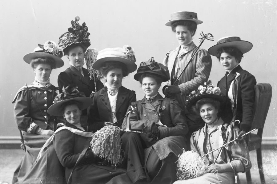 Ladies in beautiful hats and dresses