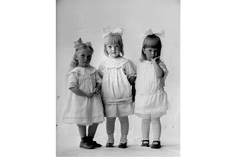Three little girls in their finest dresses, 1917