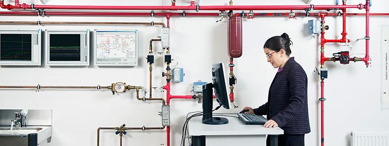Associate Professor Natasa Nord monitoring a district heating system.