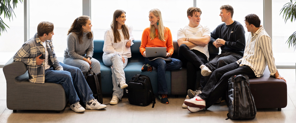 Students sitting in a sofa