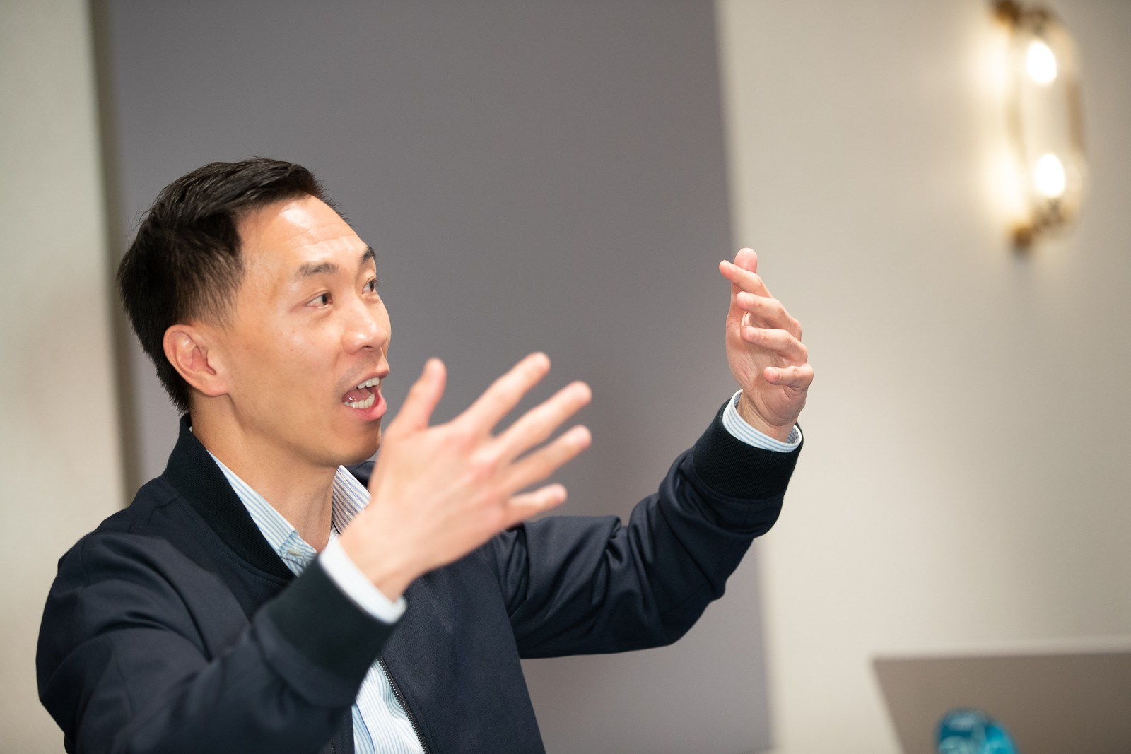 PIMS Executive Forum participant gestures as he speaks