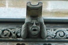 Gargoyle with tension-type headache at Nidaros Cathedral, Trondheim.