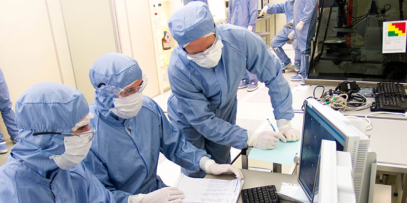 Three people in the nano laboratory