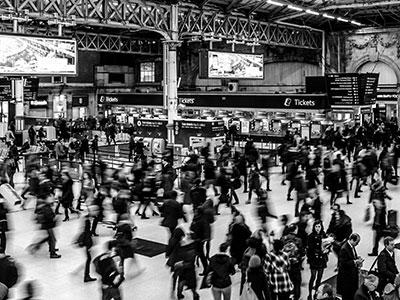 People walking in a train station. Photo: Pexels